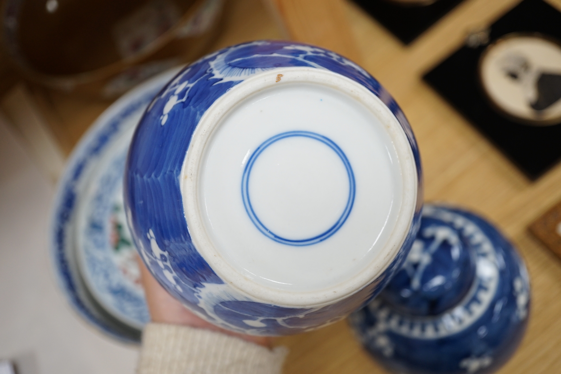 A group of Japanese and Chinese ceramics to include two blue and white jars, a wucai bowl etc.